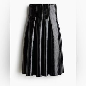 Coated leather pleated skirt